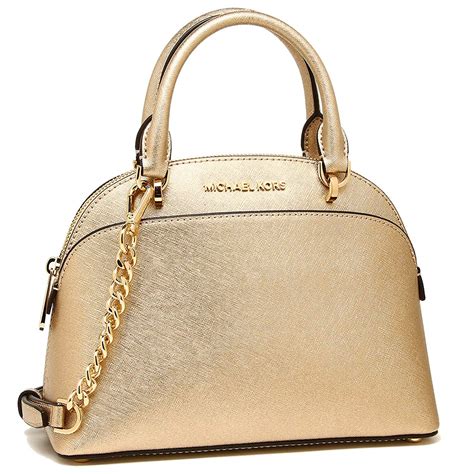 michael kors gold handbag is for regular use|Michael Kors gold crossbody bag.